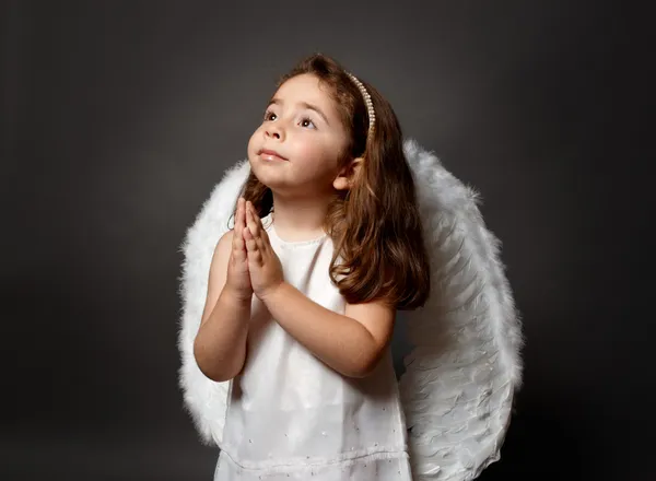 圣洁的天使祈祷 图库图片