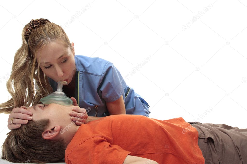 Nurse using resuscitation mask