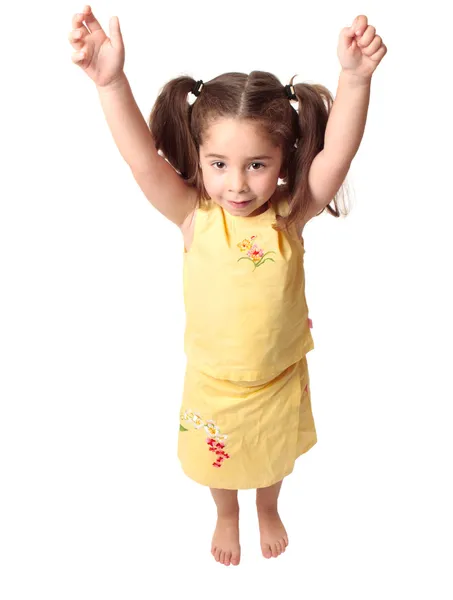 Menina pré-escolar braços levantados acima da cabeça — Fotografia de Stock
