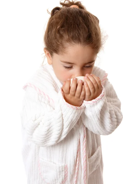 Little girl sniffing fragrant soap — Stock Photo, Image