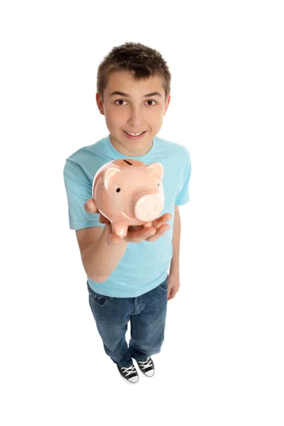 Uśmiechnięty chłopiec trzyma pieniądze pudełko różowy świnia — Zdjęcie stockowe