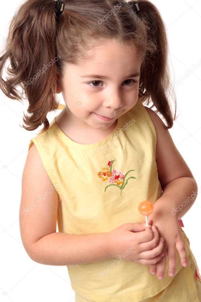 Shy toddler little girl smiling