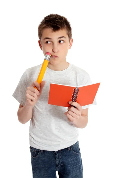 Schüler denken Bleistift und Buch — Stockfoto
