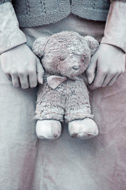 Teddy-bear in hands clipart