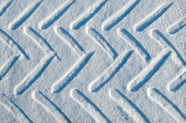 Samochód track w śniegu — Zdjęcie stockowe