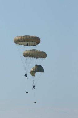 Jumping paratroopers clipart