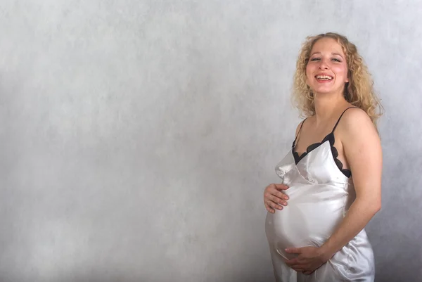 De zwangere meisje. — Stockfoto
