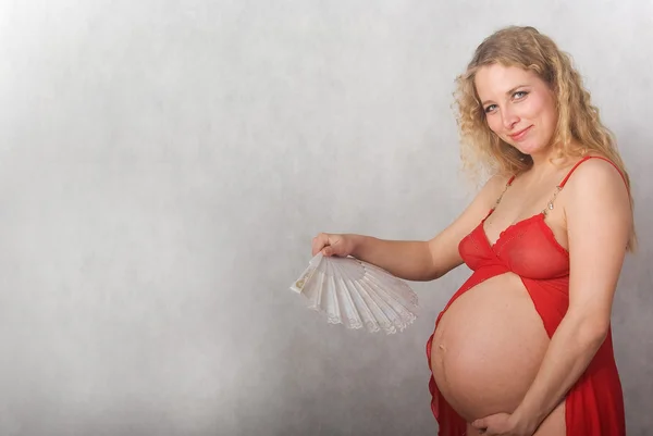 Das schwangere Mädchen. Stockbild