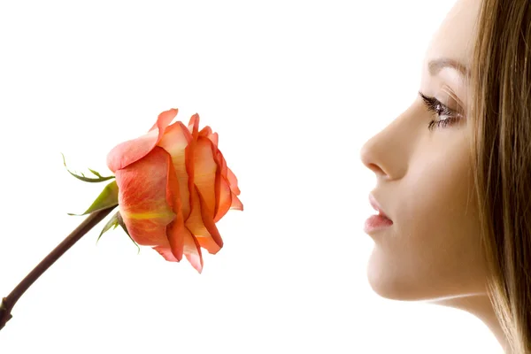 Beautiful woman with rose sideview isolated — Stock Photo, Image
