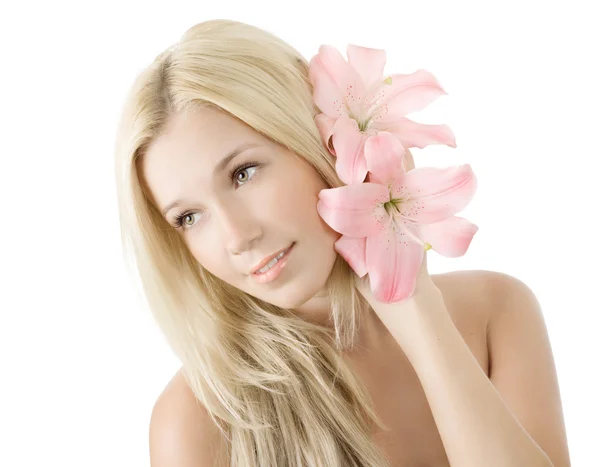 Beautiful young blonde woman with lily flower — Stock Photo, Image