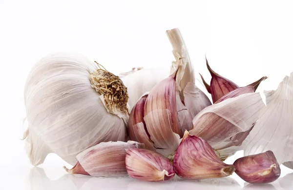 Garlic bulbs on white background — Stock Photo, Image