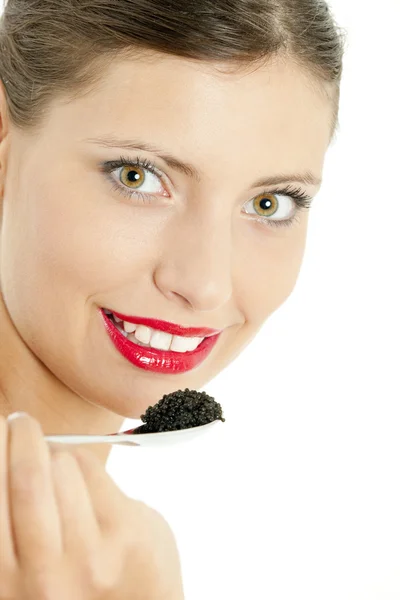 Mujer con caviar negro —  Fotos de Stock