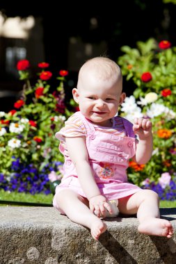 Toddler in garden clipart