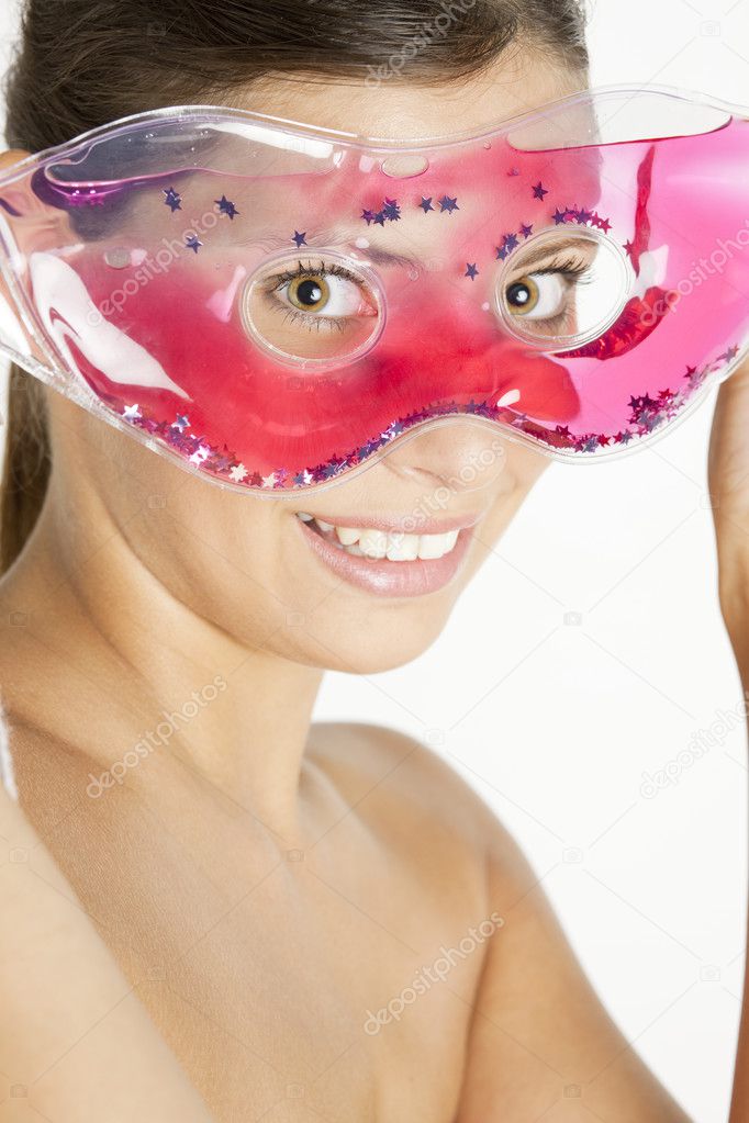 Woman with cooling facial mask
