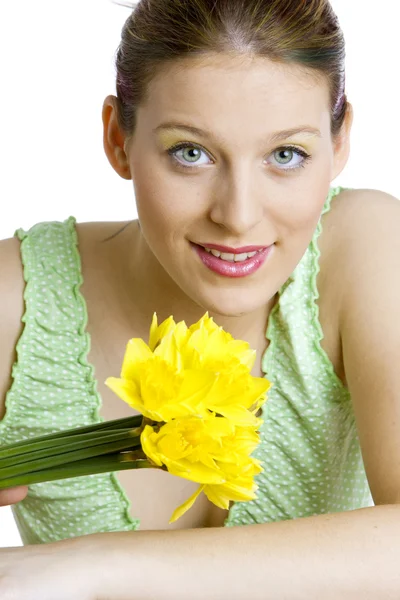 Woman with daffodils Royalty Free Stock Images