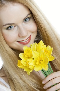 Woman with daffodils clipart