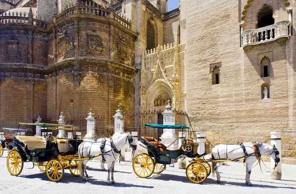 Sevilla'daki küçük yük arabalar — Stok fotoğraf
