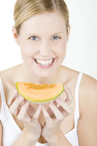 Vrouw met meloen — Stockfoto