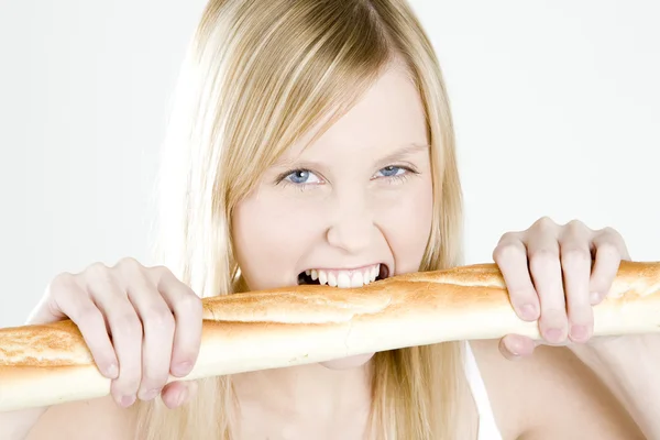 Woman with baguette — Stock Photo, Image