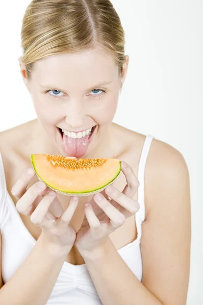 Mujer con melón —  Fotos de Stock