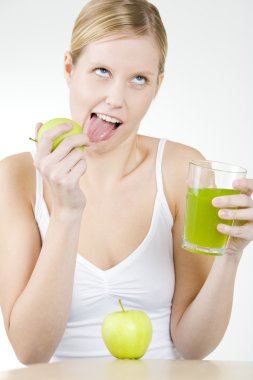 Woman with a glass of juice clipart