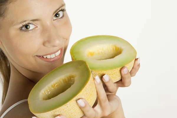 Woman with melon — Stock Photo, Image