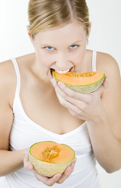 Woman with melon — Stock Photo, Image