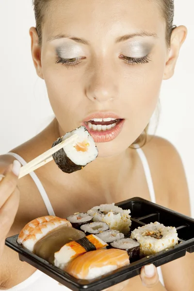 Stock image Woman with sushi