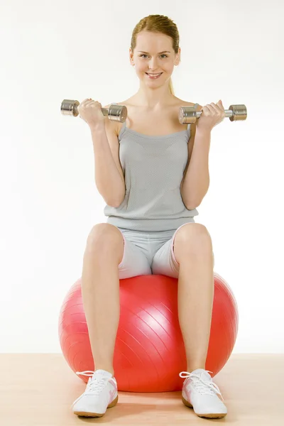 Exercising woman Stock Image