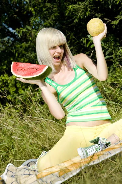 Woman with melons — Stock Photo, Image