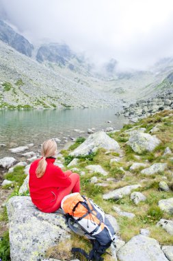 Woman backpacker in High Tatras clipart