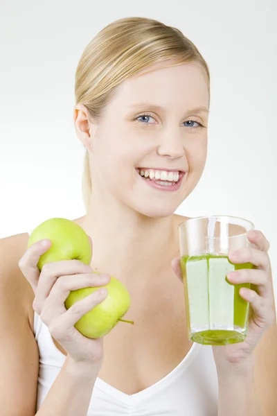 Woman with a glass of juice — Stock Photo, Image