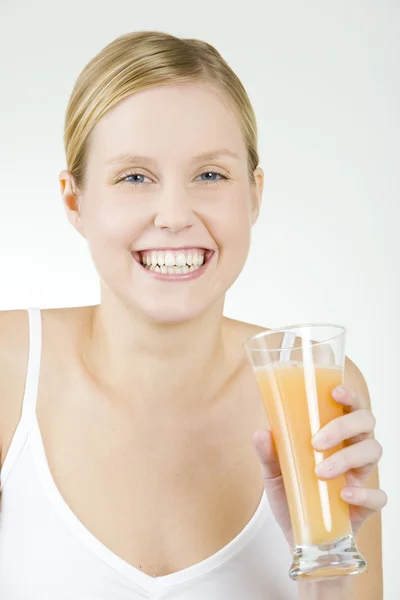 Portrait of woman with a glass of juice — Stock Photo, Image