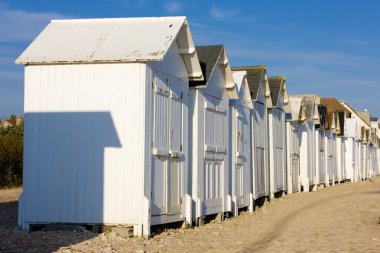 Huts on the beach, Bernieres-s-Mer, Normandy, France clipart