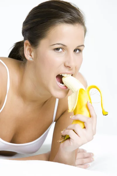 Retrato de mulher com uma banana — Fotografia de Stock