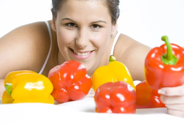 Portrait of woman with peppers — Stock Photo, Image