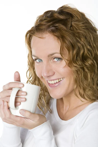 Woman holding a mug Stock Image