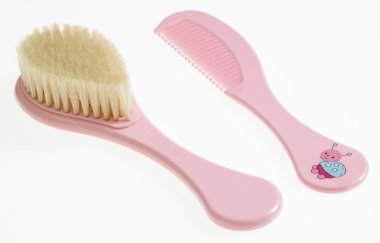 Hair brushes for a baby clipart