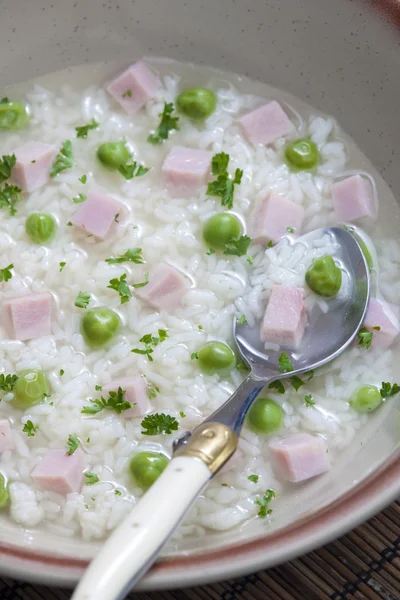 Smoked meat bouillon with peas and rice — Stock Photo, Image