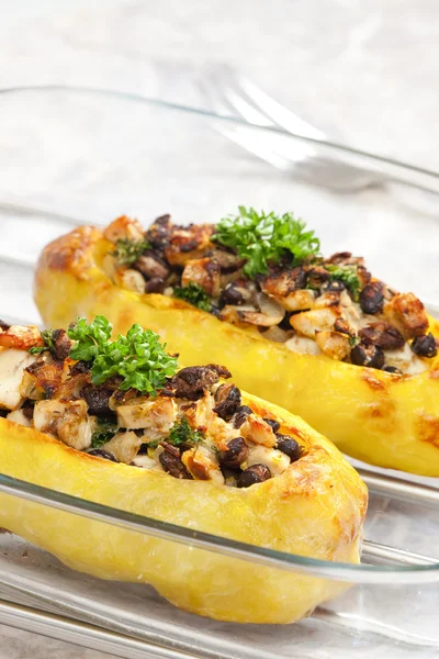 Chicken meat with black beans baked in potatoes — Stock Photo, Image