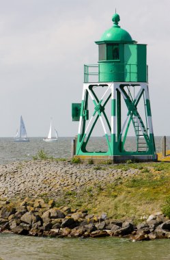 Lighthouse and yachts, Stavoren, Friesland, Netherlands