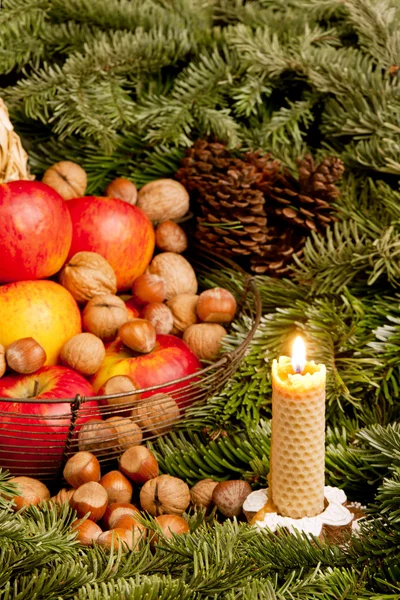 Christmas still life with a candle — Stock Photo, Image