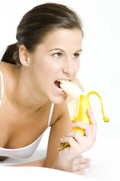 Женщина с бананом — стоковое фото