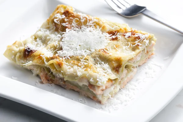 Spinach lasagne with salmon — Stock Photo, Image