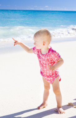 Toddler on the beach clipart