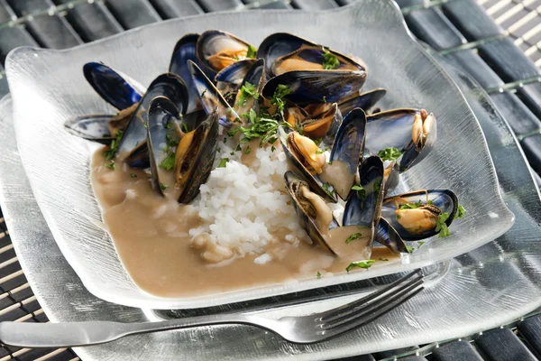 Mussels on curry paste — Stock Photo, Image