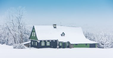 Cottage in winter clipart
