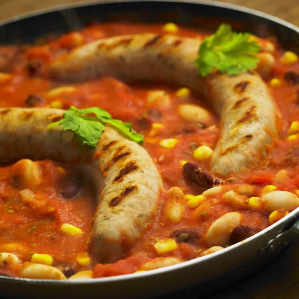 Sausages with beans — Stock Photo, Image