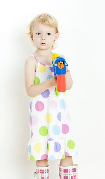 Little girl with bubbles maker — Stock Photo, Image