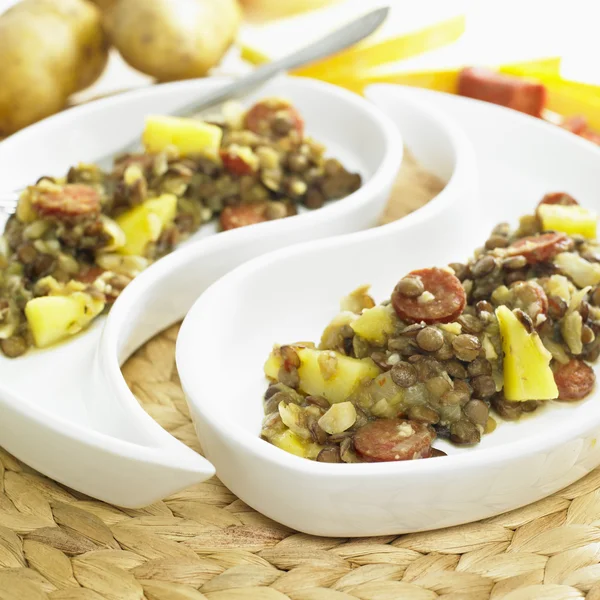 Lentil with potatoes and chorizo — Stock Photo, Image